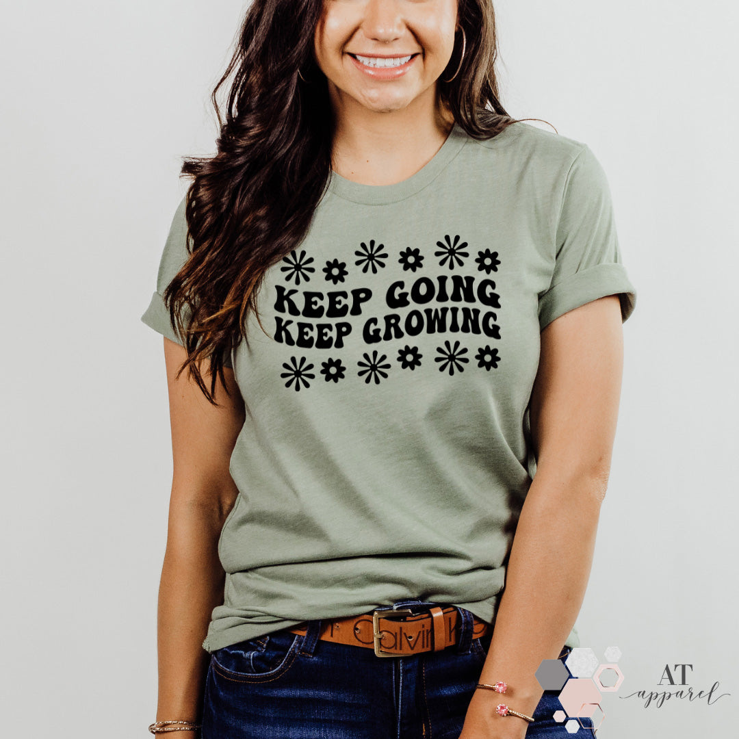 Woman wearing Keep Going Keep Growing Tee in Heather Sage