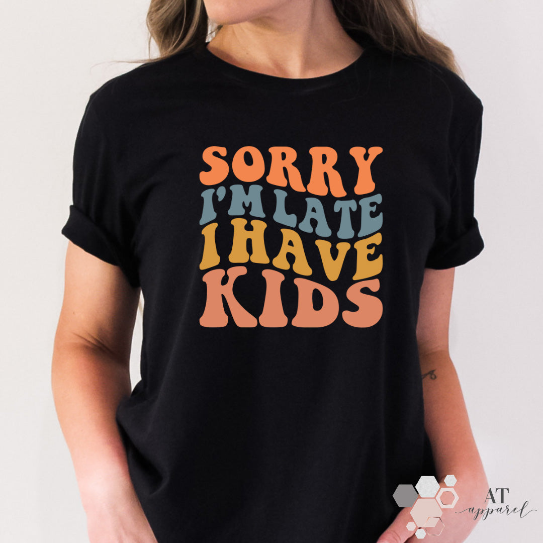 Woman wearing Sorry I'm Late I Have Kids Tee in black